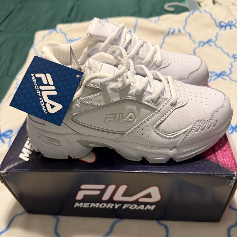 Fila Wonen’s Sneakers in White Brand new in box and tags never wore.
